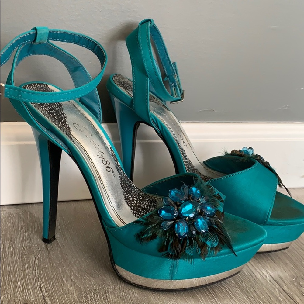 Teal dress heels with peacock feathers